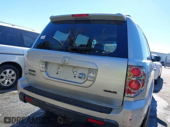 2006 Honda Pilot EX-L with VIN 5FNYF18726B024951, listed as a IAAI auction lot 41639283 with 370,476 mi miles and . Bid and sale history available at DreamBid. Image 16.