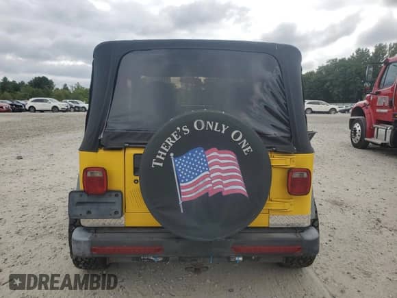 2000 Jeep Wrangler SE with VIN 1J4FA29P0YP775110, listed as a Copart auction lot 71498795 with 72,782 mi miles and Clean title. Bid and sale history available at DreamBid. Image 6.