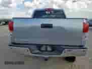 2013 Toyota Tundra Platinum с VIN 5TFFY5F10DX145553, выставлен на аукционе Copart как лот 82311405 с пробегом 142 592 миль миль и Списание • Salvage title. История ставок и продаж доступна на DreamBid. Изображение 6.