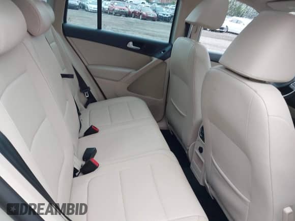 2011 Volkswagen Tiguan S with VIN WVGBV7AX0BW514599, listed as a IAAI auction lot 43051133 with 124,921 mi miles and . Bid and sale history available at DreamBid. Image 8.