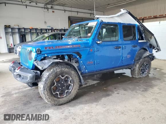 2023 Jeep Wrangler Rubicon with VIN 1C4HJXFN7PW693166, listed as a Copart auction lot 84430324 with 40,093 mi miles and Salvage title. Bid and sale history available at DreamBid. Image 1.