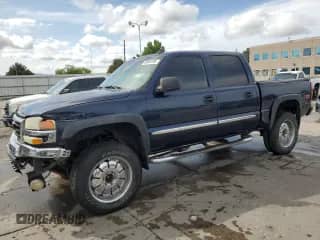 2005 GMC Sierra 1500 SLE z VIN 2GTEK13T751200347, wystawiony jako Copart lot #60863495 z przebiegiem 272 891 mil mil oraz Czysty tytuł • Clean title. Historia ofert i sprzedaży dostępna na DreamBid. Obrazek 1.