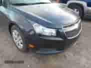 2014 Chevrolet Cruze LS z VIN 1G1PA5SH4E7265880, wystawiony jako IAAI lot #43449000 z przebiegiem 160 393 mil mil oraz . Historia ofert i sprzedaży dostępna na DreamBid. Obrazek 6.