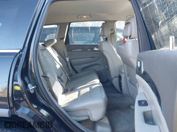 2011 Jeep Grand Cherokee 70th Anniversary z VIN 1J4RR4GT8BC504618, wystawiony jako IAAI lot #40993960 z przebiegiem 188 098 mil mil oraz . Historia ofert i sprzedaży dostępna na DreamBid. Obrazek 8.