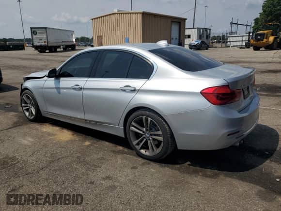 2017 BMW 3 Series 330i xDrive with VIN WBA8D9C38HA004785, listed as a Copart auction lot 66630725 with 50,040 mi miles and Salvage title. Bid and sale history available at DreamBid. Image 2.