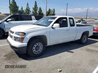 2009 Chevrolet Colorado Work Truck with VIN 1GCCS19E698155811, listed as a Copart auction lot 71654205 with 214,756 mi miles and Salvage title. Bid and sale history available at DreamBid. Image 1.
