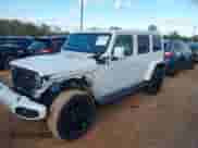 2021 Jeep Wrangler Unlimited Sahara z VIN 1C4JJXP64MW840094, wystawiony jako IAAI lot #40830676 z przebiegiem 31 716 mil mil oraz . Historia ofert i sprzedaży dostępna na DreamBid. Obrazek 2.