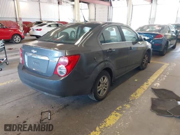 2012 Chevrolet Sonic LT with VIN 1G1JC5SB3C4168812, listed as a IAAI auction lot 42748632 with 130,949 mi miles and . Bid and sale history available at DreamBid. Image 4.