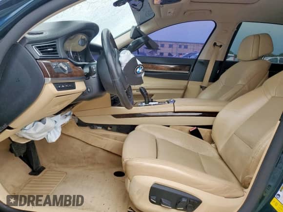 2013 BMW 7 Series 750Li с VIN WBAYE8C54DD132832, выставлен на аукционе Copart как лот 63086555 с пробегом Не указан миль и Списание • Salvage title. История ставок и продаж доступна на DreamBid. Изображение 7.
