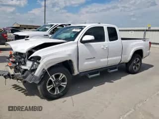 2016 Toyota Tacoma TRD Sport с VIN 5TFRZ5CN0GX003046, выставлен на аукционе Copart как лот 70905475 с пробегом 73 182 миль миль и Списание • Salvage title. История ставок и продаж доступна на DreamBid. Изображение 1.