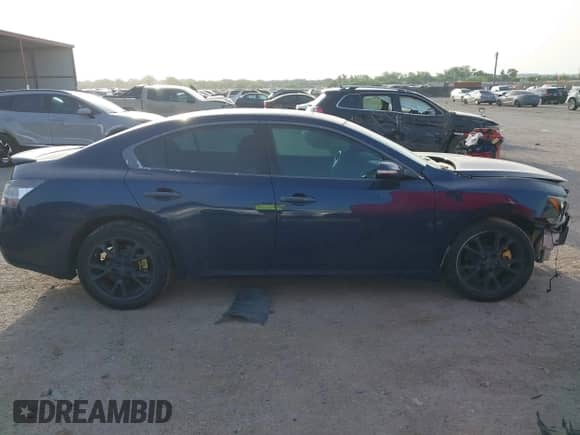 2014 Nissan Maxima SV z VIN 1N4AA5AP0EC907305, wystawiony jako IAAI lot #42262072 z przebiegiem 130 541 mil mil oraz . Historia ofert i sprzedaży dostępna na DreamBid. Obrazek 13.