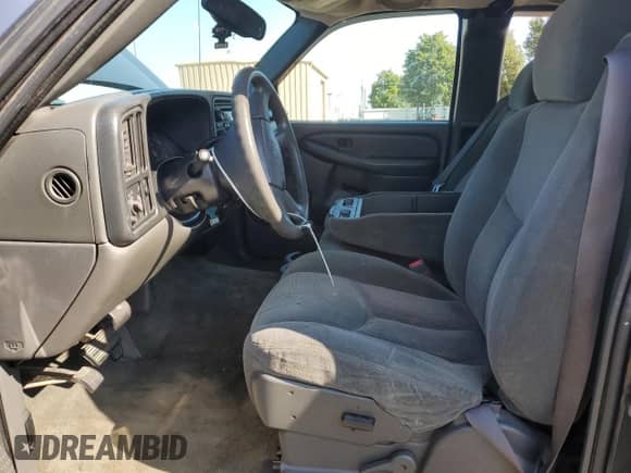 2005 Chevrolet Silverado 1500 Work Truck with VIN 1GCEC19XX5Z165088, listed as a Copart auction lot 71112955 with Not provided miles and Salvage title. Bid and sale history available at DreamBid. Image 7.