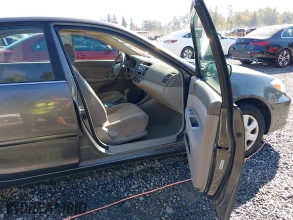 2003 Toyota Camry LE with VIN JTDBE32K530180767, listed as a IAAI auction lot 43276458 with 189,568 mi miles and . Bid and sale history available at DreamBid. Image 5.