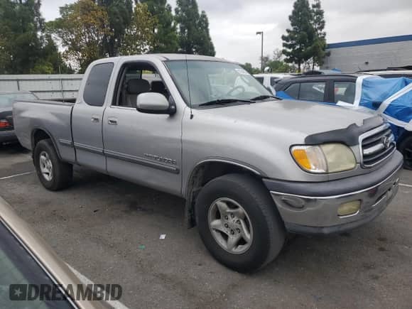 2002 Toyota Tundra SR5 z VIN 5TBRT34142S281716, wystawiony jako Copart lot #81994505 z przebiegiem Nie podano mil oraz Szkoda całkowita • Salvage title. Historia ofert i sprzedaży dostępna na DreamBid. Obrazek 4.