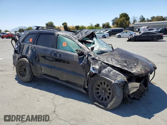 2019 Jeep Grand Cherokee Overland z VIN 1C4RJFCT5KC661358, wystawiony jako Copart lot #66953355 z przebiegiem 109 142 mil mil oraz Nie do naprawy • Non repairable. Historia ofert i sprzedaży dostępna na DreamBid. Obrazek 4.