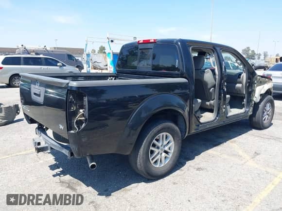 2014 Nissan Frontier SV with VIN 1N6AD0ER0EN737884, listed as a IAAI auction lot 42499078 with 165,060 mi miles and . Bid and sale history available at DreamBid. Image 4.