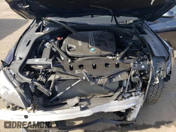 2015 BMW 7 Series with VIN WBAYG6C53FD383679, listed as a Copart auction lot 40007773 with 58,328 mi miles and . Bid and sale history available at DreamBid. Image 12.