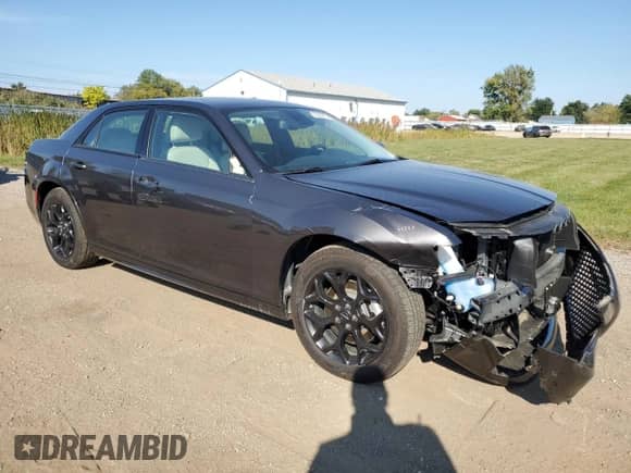 2023 Chrysler 300 Touring L with VIN 2C3CCASG4PH677731, listed as a Copart auction lot 81020975 with 5,050 mi miles and Salvage title. Bid and sale history available at DreamBid. Image 4.