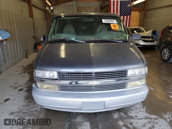 2000 Chevrolet Astro z VIN 1GNEL19WXYB140753, wystawiony jako Copart lot #74493894 z przebiegiem 141 609 mil mil oraz Szkoda całkowita • Salvage title. Historia ofert i sprzedaży dostępna na DreamBid. Obrazek 5.