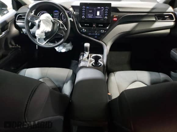 2024 Toyota Camry LE with VIN 4T1C11AK4RU233509, listed as a Copart auction lot 53873885 with 20,787 mi miles and Clean title. Bid and sale history available at DreamBid. Image 8.