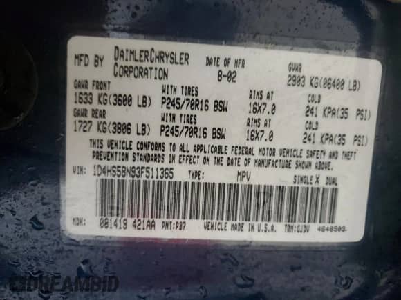 2003 Dodge Durango SLT Plus z VIN 1D4HS58N93F511365, wystawiony jako Copart lot #82062555 z przebiegiem 182 149 mil mil oraz Szkoda całkowita • Salvage title. Historia ofert i sprzedaży dostępna na DreamBid. Obrazek 13.