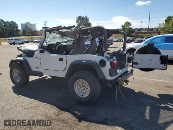 1997 Jeep Wrangler SE с VIN 1J4FY29P7VP526522, выставлен на аукционе Copart как лот 80190625 с пробегом 187 292 миль миль и Списание • Salvage title. История ставок и продаж доступна на DreamBid. Изображение 2.