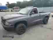 2003 Dodge Dakota с VIN 1D7FL36X03S159557, выставлен на аукционе Copart как лот 85516535 с пробегом 209 972 миль миль и Списание • Salvage title. История ставок и продаж доступна на DreamBid. Изображение 1.