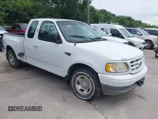 2003 Ford F-150 XL with VIN 1FTRX07263KD53880, listed as a IAAI auction lot 42422353 with 192,630 mi miles and . Bid and sale history available at DreamBid. Image 1.