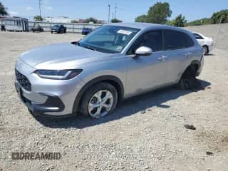 2023 Honda HR-V LX with VIN 3CZRZ1H34PM716158, listed as a Copart auction lot 65837385 with 15,359 mi miles and Salvage title. Bid and sale history available at DreamBid. Image 1.