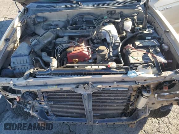 1997 Toyota Tacoma z VIN 4TAWM72NXVZ328170, wystawiony jako Copart lot #81649744 z przebiegiem 171 620 mil mil oraz Szkoda całkowita • Salvage title. Historia ofert i sprzedaży dostępna na DreamBid. Obrazek 12.