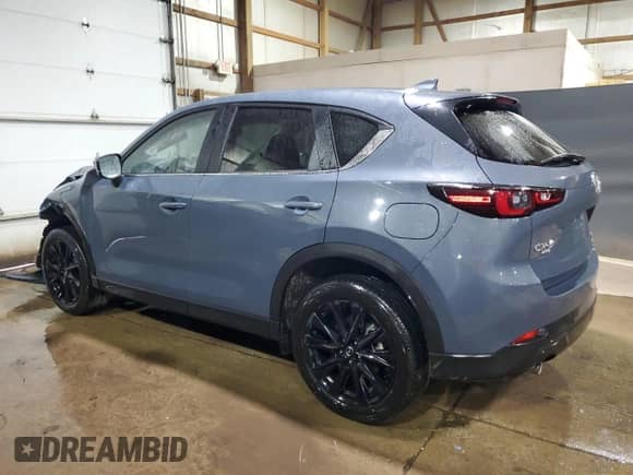 2025 Mazda CX-5 S Carbon Edition z VIN JM3KFBCM4S0687625, wystawiony jako Copart lot #85743625 z przebiegiem 9 090 mil mil oraz Szkoda całkowita • Salvage title. Historia ofert i sprzedaży dostępna na DreamBid. Obrazek 2.