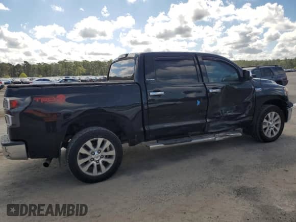 2012 Toyota Tundra Limited with VIN 5TFHW5F13CX228908, listed as a Copart auction lot 80839025 with 290,275 mi miles and Salvage title. Bid and sale history available at DreamBid. Image 3.