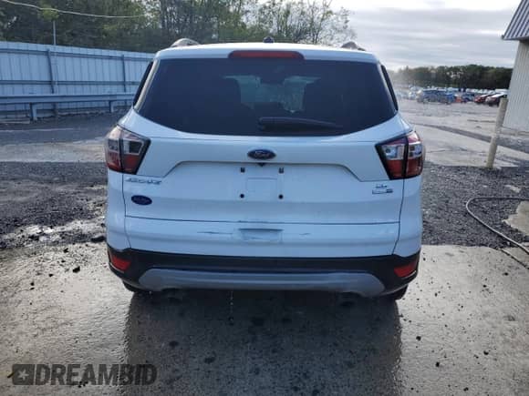 2018 Ford Escape SE с VIN 1FMCU9GD6JUB95008, выставлен на аукционе Copart как лот 85739545 с пробегом 145 014 миль миль и Чистый • Clean title. История ставок и продаж доступна на DreamBid. Изображение 6.