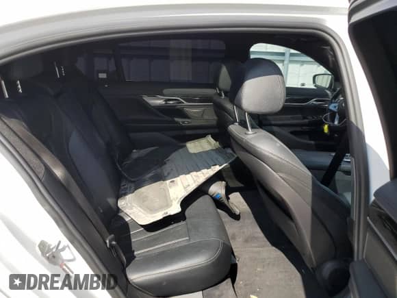 2018 BMW 7 Series 740i с VIN WBA7E2C57JG741724, выставлен на аукционе Copart как лот 69194665 с пробегом 85 919 миль миль и Чистый • Clean title. История ставок и продаж доступна на DreamBid. Изображение 10.