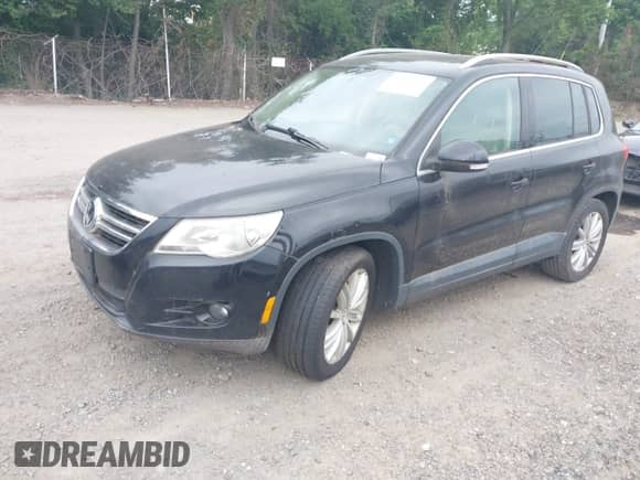 2011 Volkswagen Tiguan S with VIN WVGAV7AX1BW512369, listed as a IAAI auction lot 42859666 with 182,593 mi miles and . Bid and sale history available at DreamBid. Image 2.