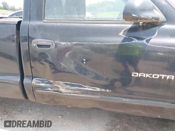 1998 Dodge Dakota SLT z VIN 1B7GL26X0WS659960, wystawiony jako IAAI lot #42427426 z przebiegiem 305 181 mil mil oraz . Historia ofert i sprzedaży dostępna na DreamBid. Obrazek 6.