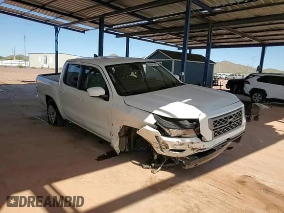 2023 Nissan Frontier SV with VIN 1N6ED1EK1PN668409, listed as a Copart auction lot 84835755 with 32,520 mi miles and Salvage title. Bid and sale history available at DreamBid. Image 13.