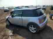 2004 MINI Hardtop with VIN WMWRC33454TJ56308, listed as a Copart auction lot 59690865 with 99,374 mi miles and Salvage title. Bid and sale history available at DreamBid. Image 2.