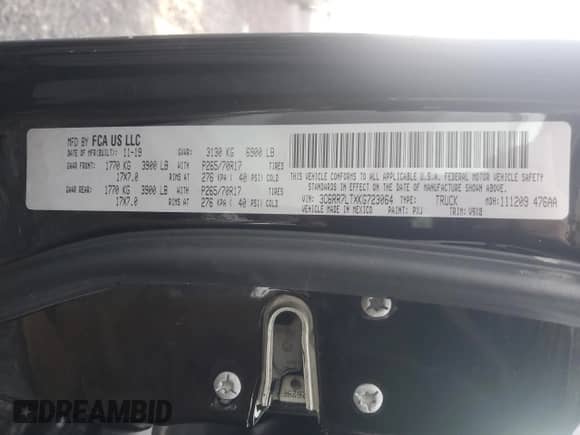 2019 Ram 1500 SLT with VIN 3C6RR7LTXKG723064, listed as a Copart auction lot 87424184 with 101,979 mi miles and Salvage title. Bid and sale history available at DreamBid. Image 13.