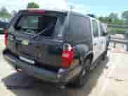 2013 Chevrolet Tahoe Commercial with VIN 1GNLC2E00DR337995, listed as a IAAI auction lot 42213635 with Not provided miles and . Bid and sale history available at DreamBid. Image 4.