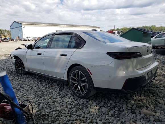 2023 BMW 7 Series 740i with VIN WBA23EH0XPCM87683, listed as a Copart auction lot 80490865 with Not provided miles and Salvage title. Bid and sale history available at DreamBid. Image 2.