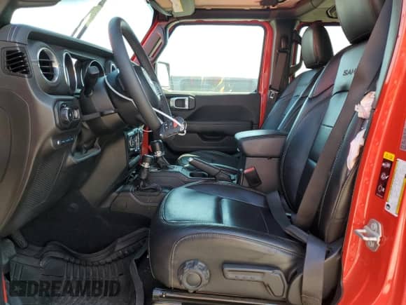 2023 Jeep Wrangler Sahara with VIN 1C4JJXP61PW700573, listed as a Copart auction lot 68339515 with 22,397 mi miles and Salvage title. Bid and sale history available at DreamBid. Image 7.