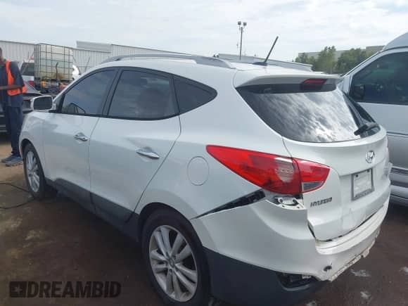 2011 Hyundai Tucson Limited with VIN KM8JU3AC1BU290260, listed as a IAAI auction lot 43415579 with 244,519 mi miles and . Bid and sale history available at DreamBid. Image 14.