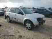 2007 Saturn VUE I4 with VIN 5GZCZ33DX7S879958, listed as a Copart auction lot 62463635 with 205,550 mi miles and Salvage title. Bid and sale history available at DreamBid. Image 4.