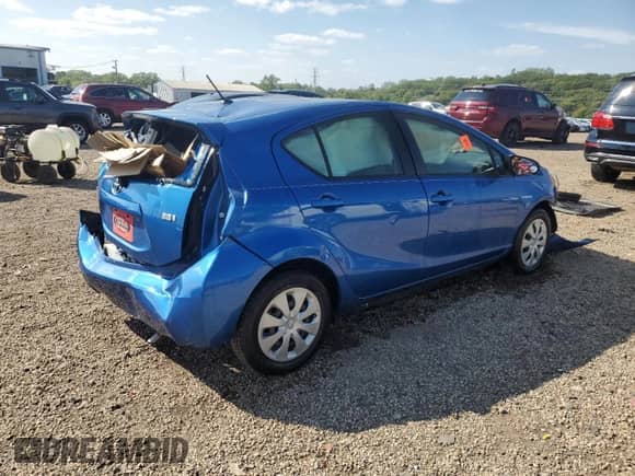 2014 Toyota Prius One with VIN JTDKDTB32E1571402, listed as a Copart auction lot 71623825 with 63,399 mi miles and Salvage title. Bid and sale history available at DreamBid. Image 3.