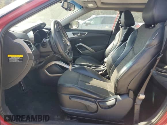 2013 Hyundai Veloster w/Black Int z VIN KMHTC6AD9DU106353, wystawiony jako Copart lot #82602835 z przebiegiem 115 712 mil mil oraz Czysty tytuł • Clean title. Historia ofert i sprzedaży dostępna na DreamBid. Obrazek 7.