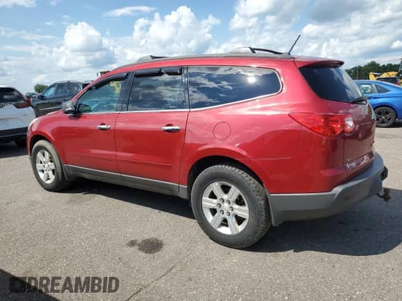 2012 Chevrolet Traverse 2LT z VIN 1GNKVJED7CJ237912, wystawiony jako Copart lot #59508255 z przebiegiem 124 031 mil mil oraz Szkoda całkowita • Salvage title. Historia ofert i sprzedaży dostępna na DreamBid. Obrazek 2.