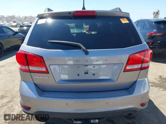 2019 Dodge Journey SE with VIN 3C4PDCBG0KT798004, listed as a IAAI auction lot 43012657 with 74,633 mi miles and . Bid and sale history available at DreamBid. Image 15.