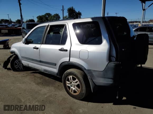 2002 Honda CR-V EX with VIN JHLRD788X2C086761, listed as a Copart auction lot 86974205 with 224,621 mi miles and Salvage title. Bid and sale history available at DreamBid. Image 2.