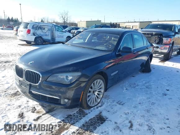 2012 BMW 7 Series 750Li xDrive with VIN WBAKC8C51CC437897, listed as a IAAI auction lot 41542970 with 133,864 mi miles and . Bid and sale history available at DreamBid. Image 2.